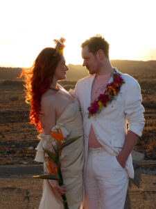 Lanzarote Elopement wedding inspiration. An unconventional Bride and Groom are stood in Lanzarotes golden hour looking at each other
